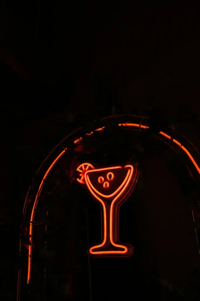 Neon cocktail sign used in branding for Don Cangrejo Bar and Grill, a vibrant Mexican restaurant known for its festive atmosphere and creative drinks.